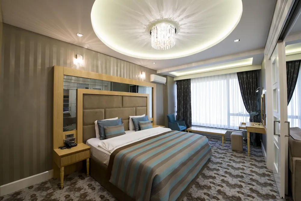 Deluxe Tek Büyük veya İki Ayrı Yataklı Oda