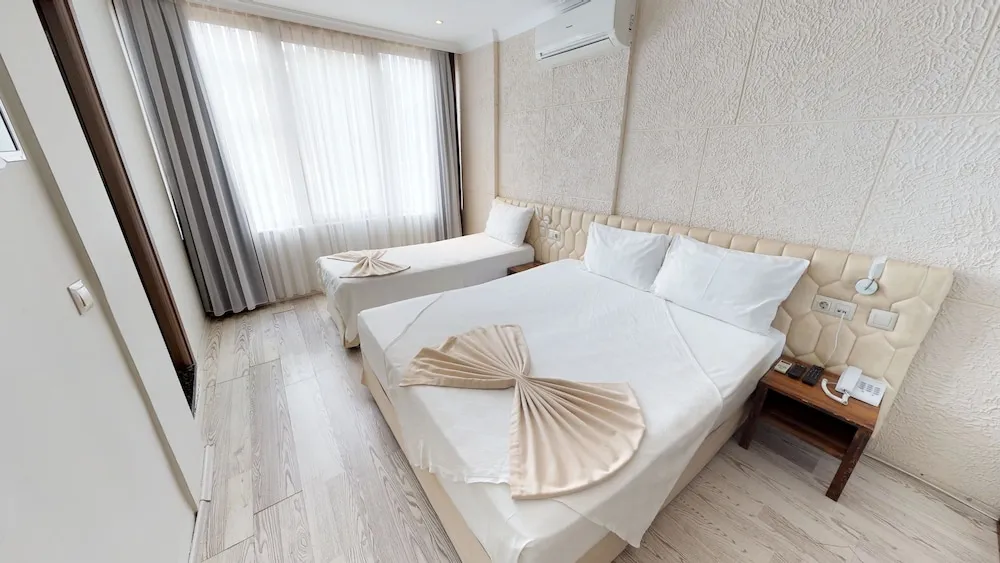 Standard Üç Kişilik Oda