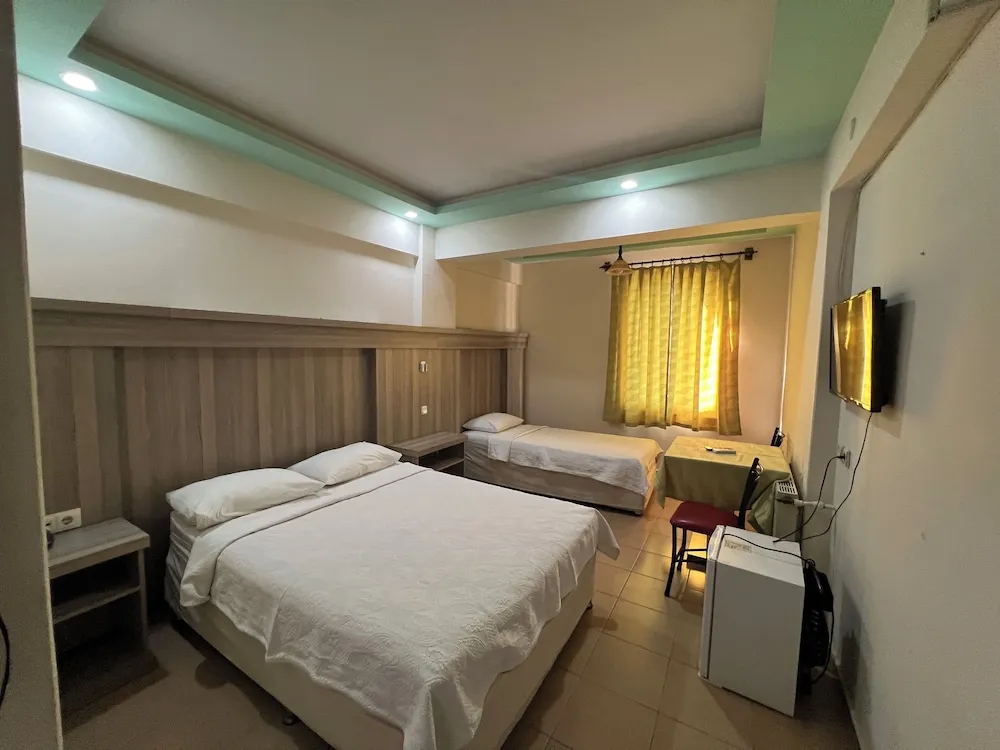 Basic Tek Büyük veya İki Ayrı Yataklı Oda