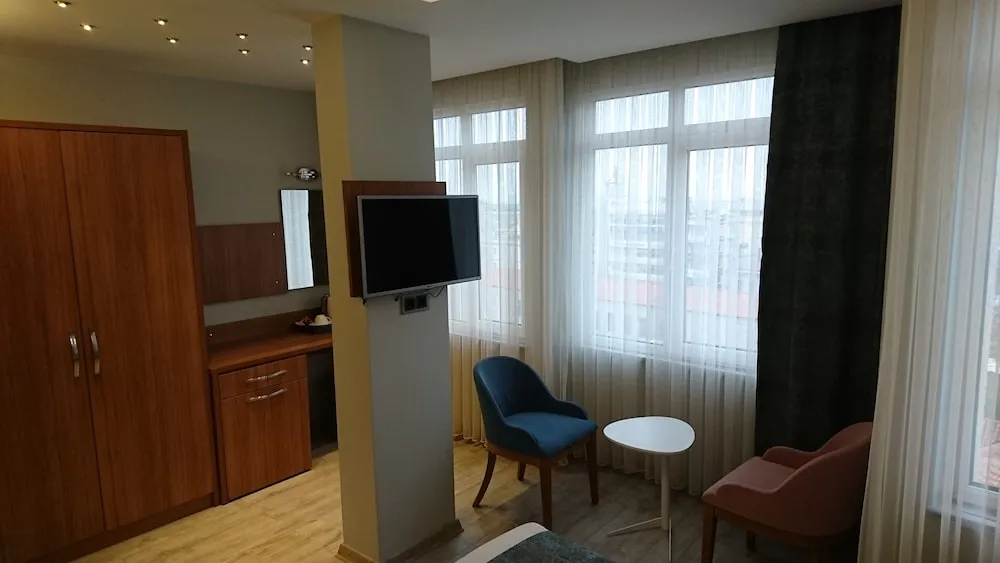 Deluxe Tek Büyük veya İki Ayrı Yataklı Oda
