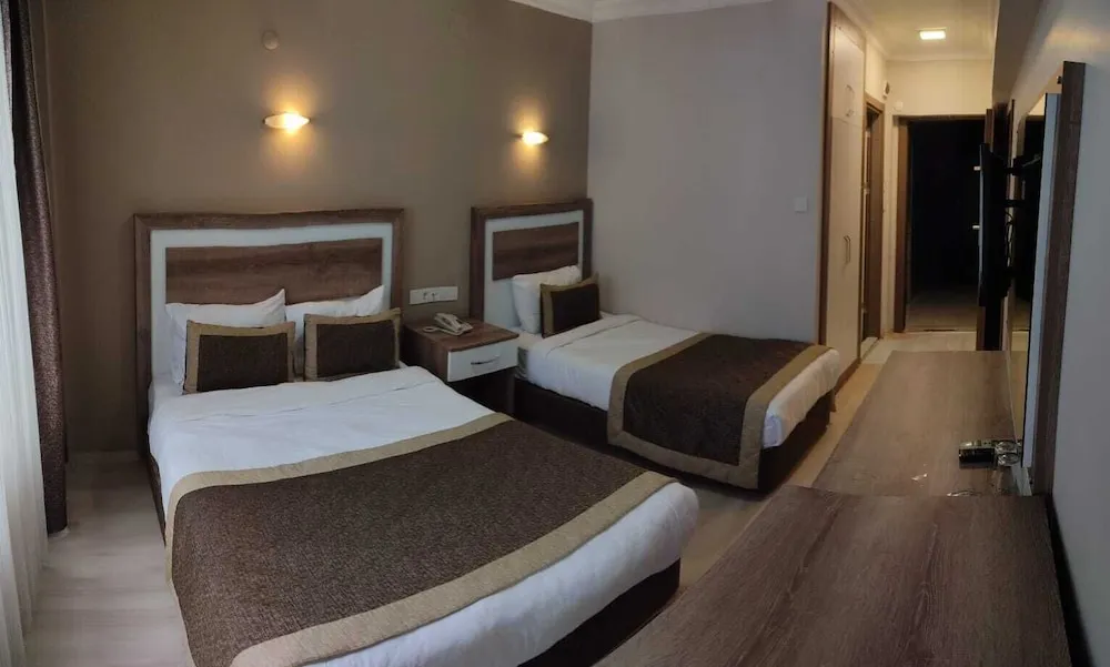 Economy Üç Kişilik Oda