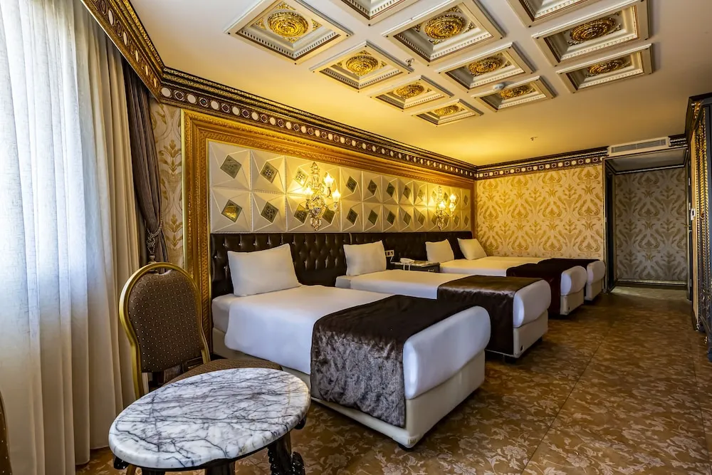 Deluxe Üç Kişilik Oda