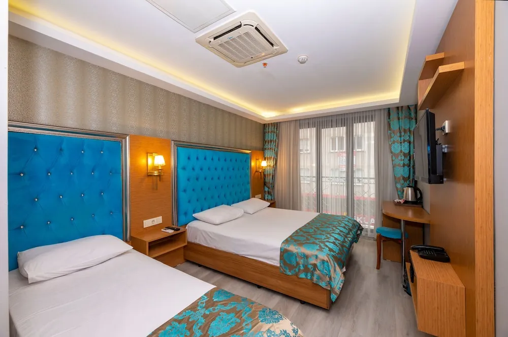 Deluxe Üç Kişilik Oda