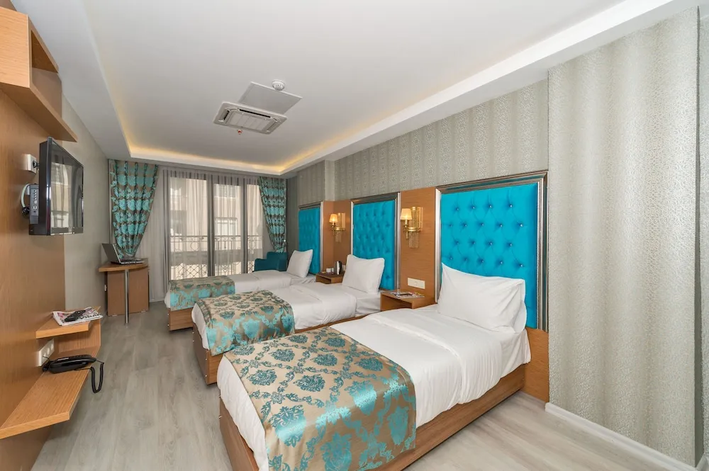 Deluxe Üç Kişilik Oda