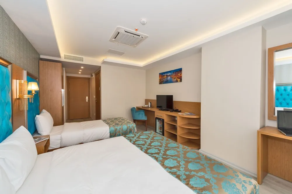 Deluxe Üç Kişilik Oda