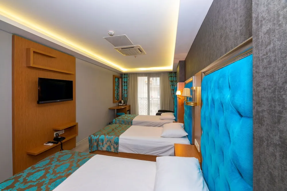 Deluxe Üç Kişilik Oda