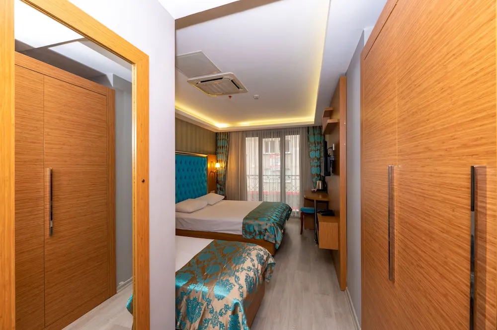 Deluxe Üç Kişilik Oda