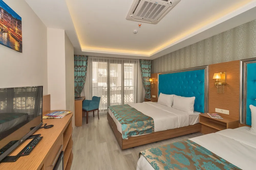 Deluxe Üç Kişilik Oda