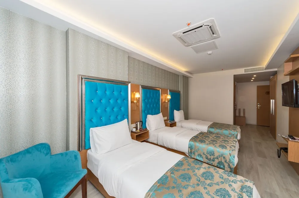 Deluxe Üç Kişilik Oda