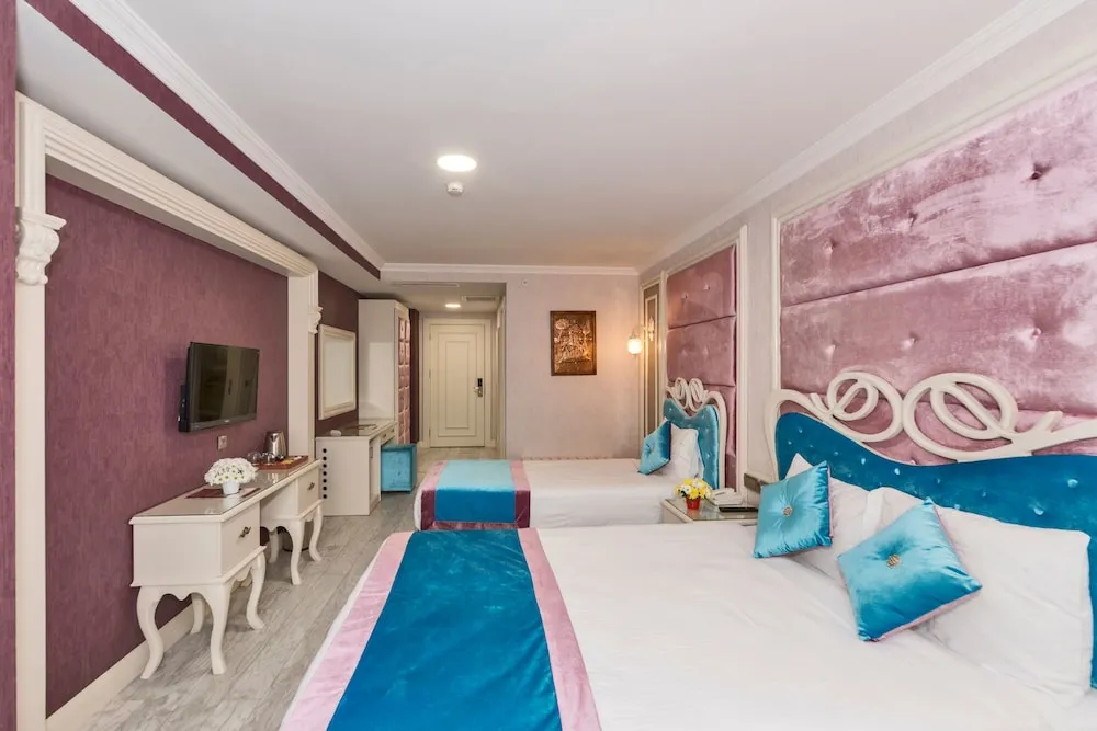 Deluxe Üç Kişilik Oda