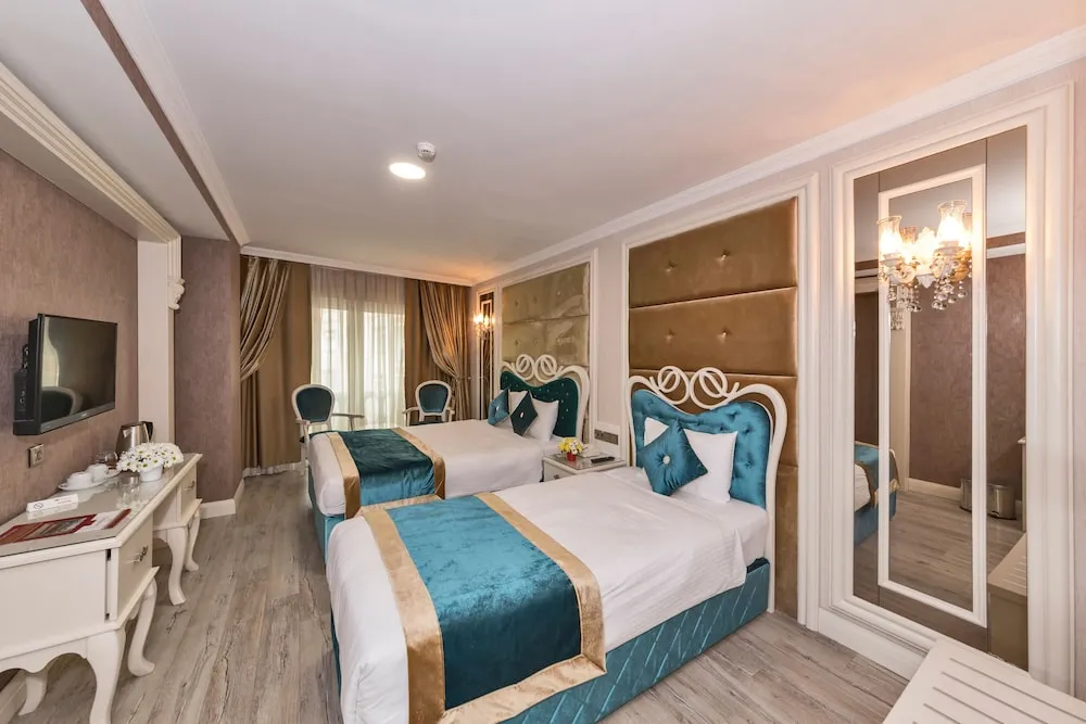 Deluxe Tek Büyük veya İki Ayrı Yataklı Oda