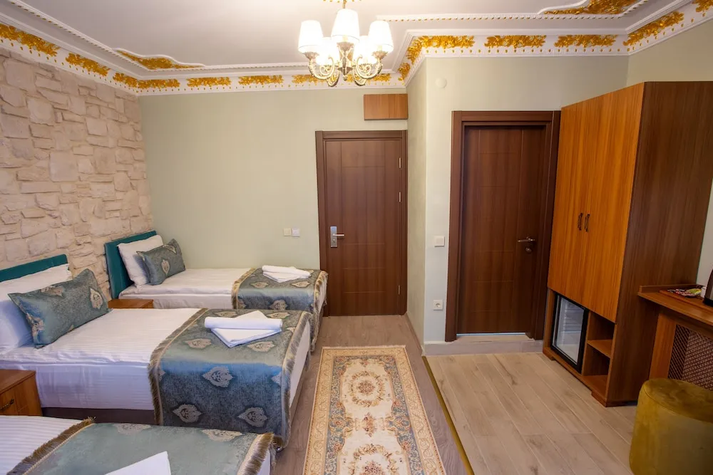 Deluxe Üç Kişilik Oda