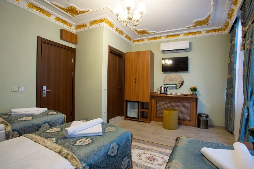 Deluxe Üç Kişilik Oda