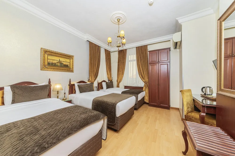 Deluxe Üç Kişilik Oda