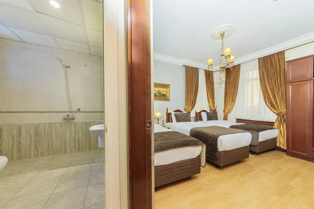 Deluxe Üç Kişilik Oda