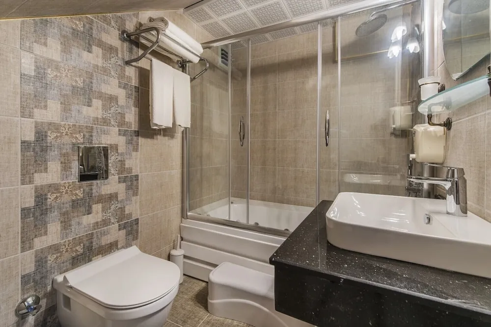 Deluxe Üç Kişilik Oda (Triple)