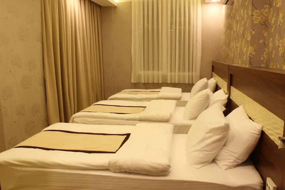 Deluxe Üç Kişilik Oda