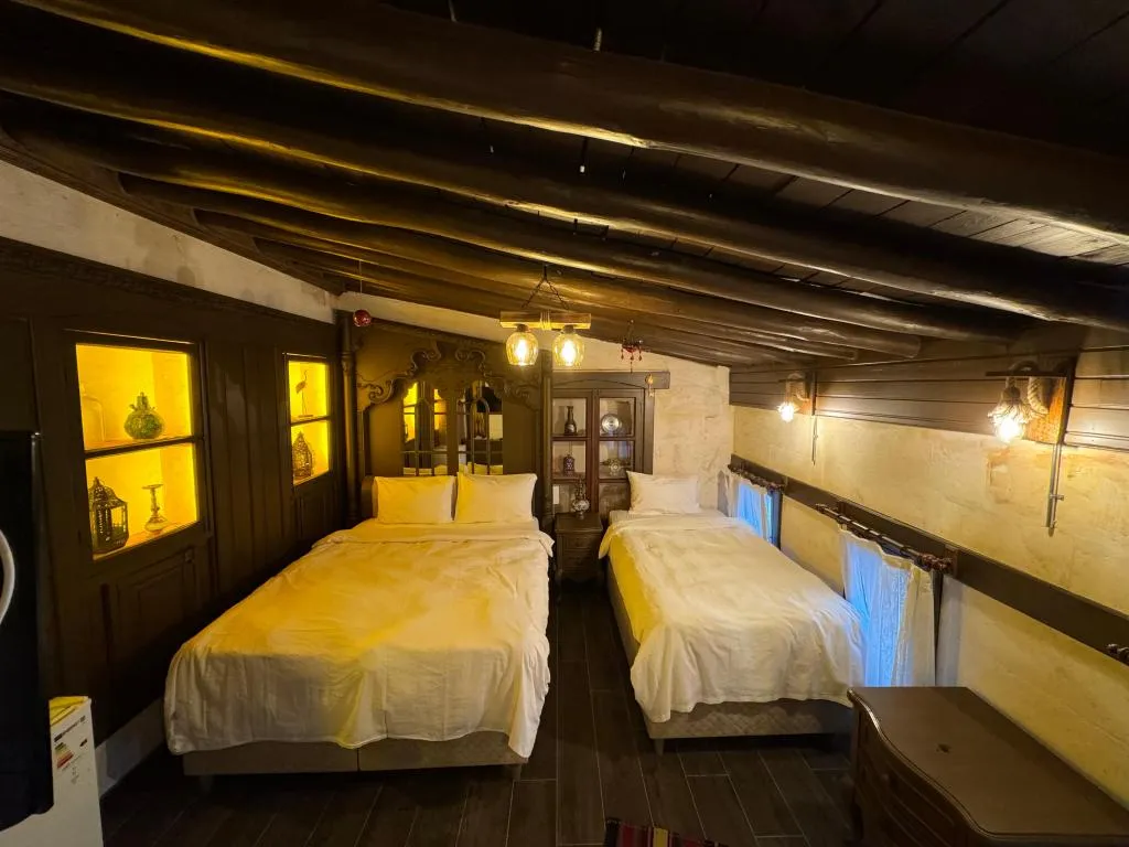 Deluxe Üç Kişilik Oda ,Bahçe Manzaralı,1. Kat