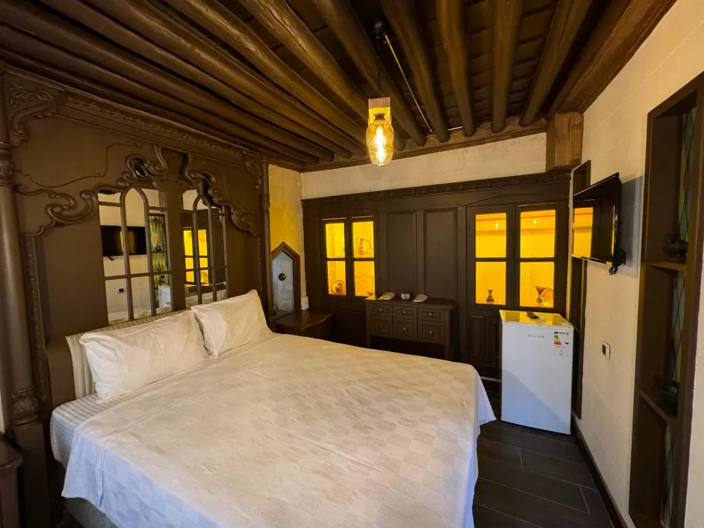 Deluxe Üç Kişilik Oda ,Bahçe Manzaralı,1. Kat
