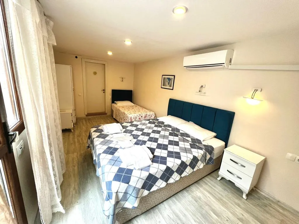 Standart Üç Kişilik Oda,Bahçe Manzaralı,Klimalı