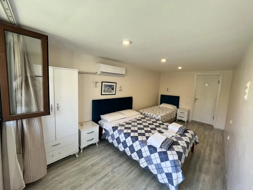 Standart Üç Kişilik Oda,Bahçe Manzaralı,Klimalı