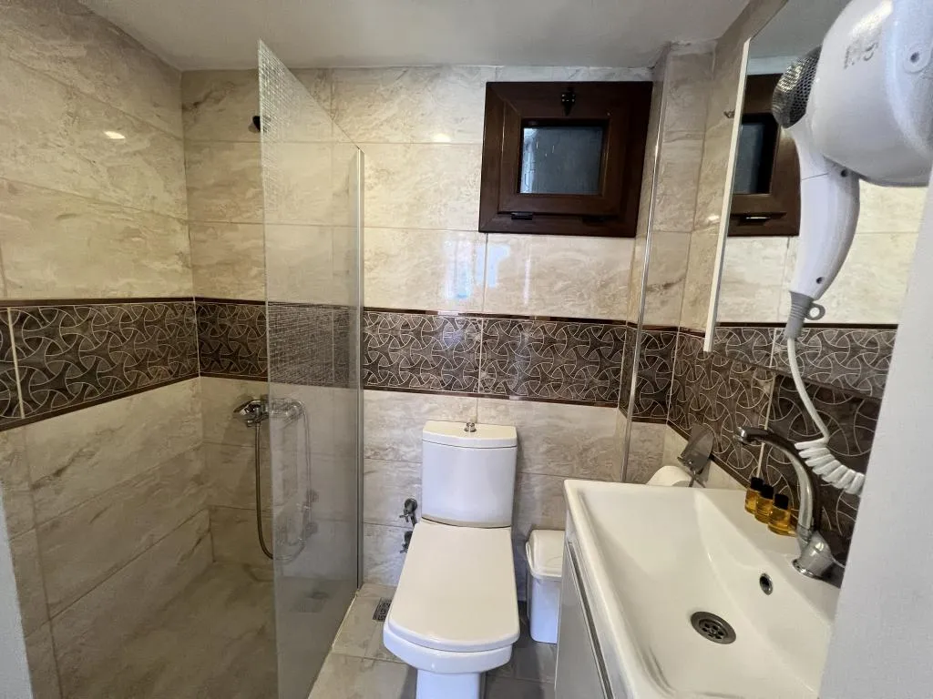 Standart Üç Kişilik Oda,Bahçe Manzaralı,Klimalı