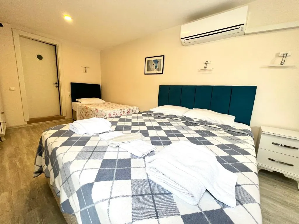 Standart Üç Kişilik Oda,Bahçe Manzaralı,Klimalı