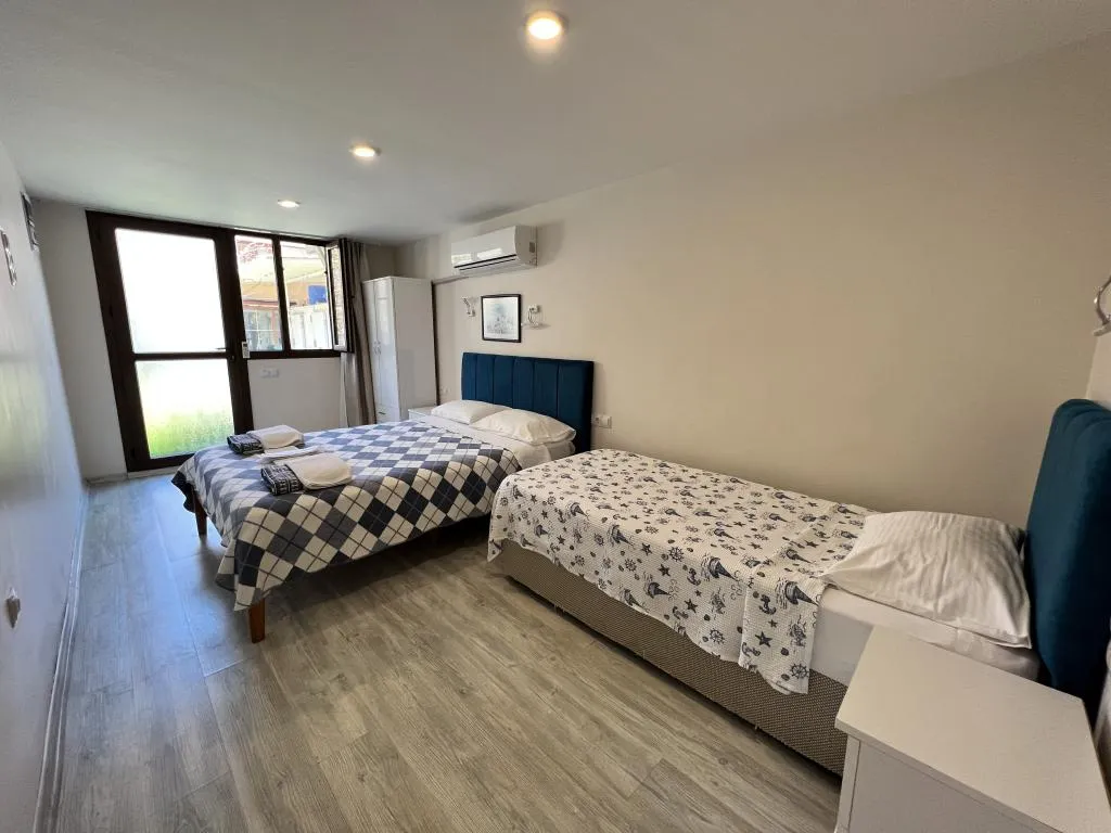 Standart Üç Kişilik Oda,Bahçe Manzaralı,Klimalı