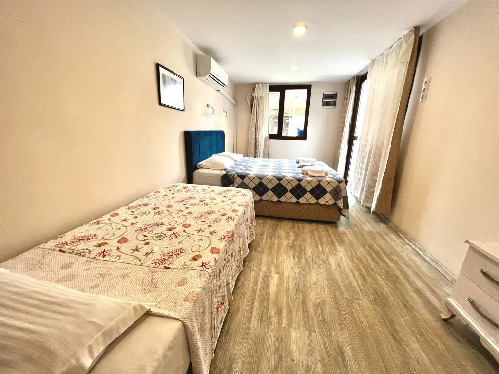 Standart Üç Kişilik Oda,Bahçe Manzaralı,Klimalı
