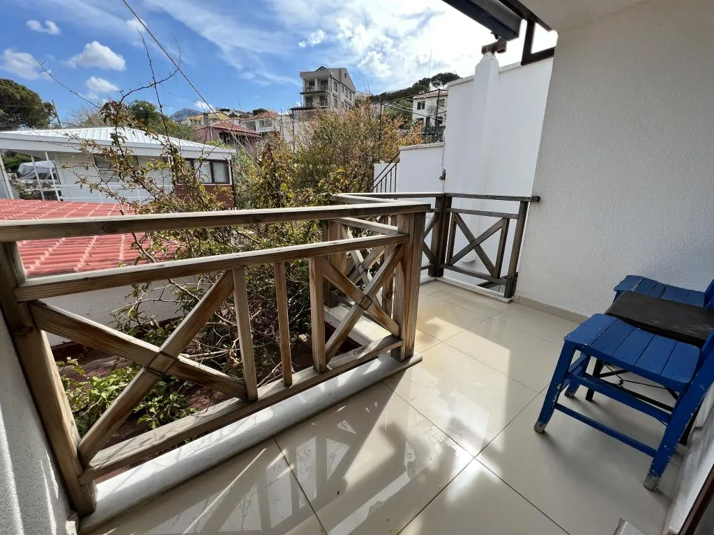 Standart Üç Kişilik Oda,Bahçe Manzaralı,Balkonlu