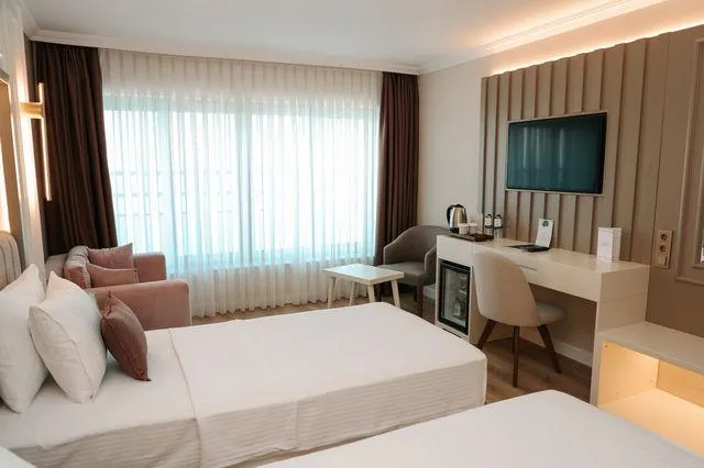 Deluxe Twin Oda,Yandan Deniz Manzaralı,İki Tek Kişilik Yataklı
