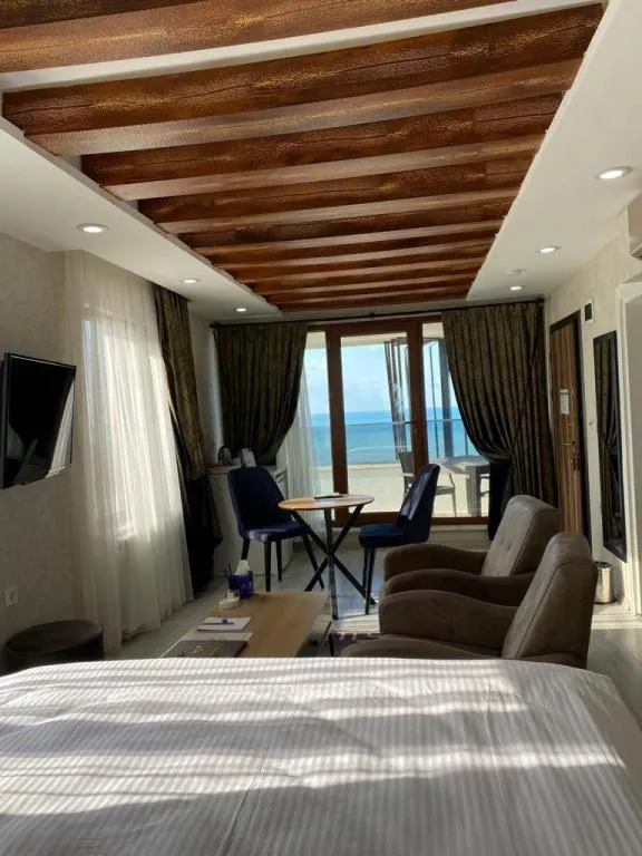 DENİZ MANZARALI DELUXE AİLE ODASI