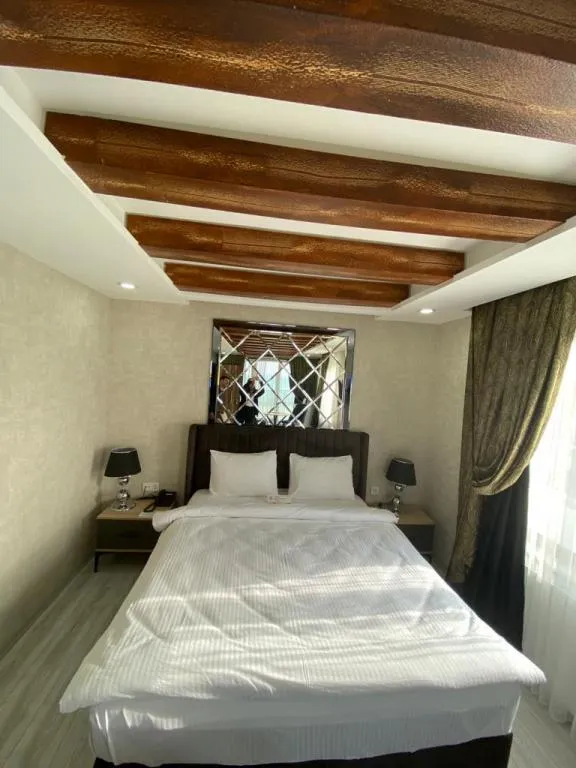 DENİZ MANZARALI DELUXE AİLE ODASI