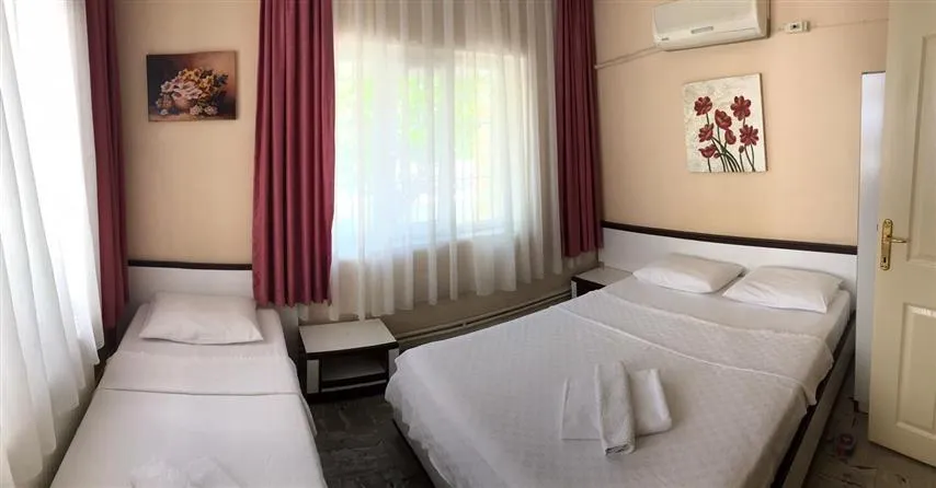 Standart Üç Kişilik Oda,Bahçe Manzaralı,Bahçe Katı