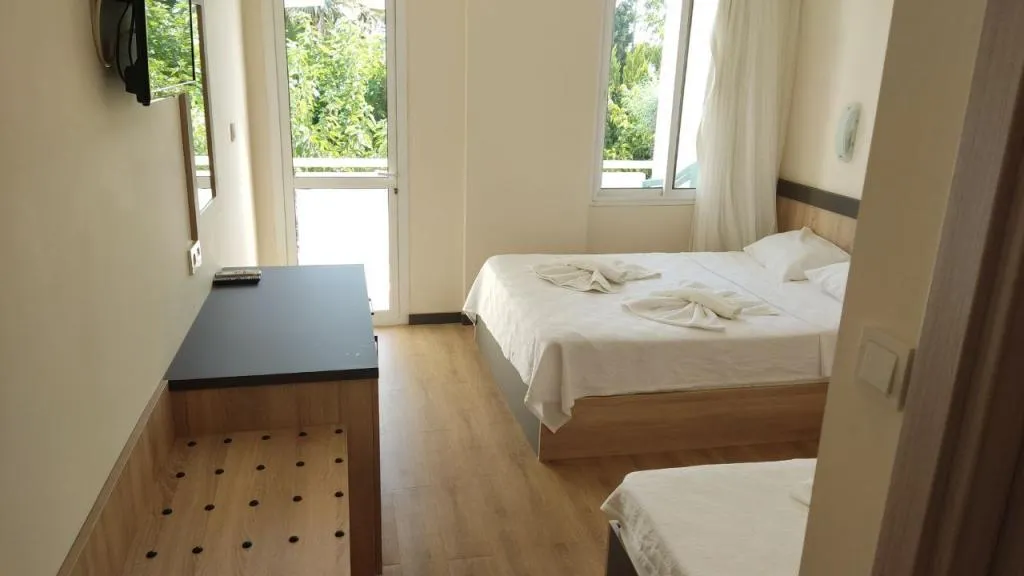 Standart Üç Kişilik Oda,Deniz Manzaralı,Balkonlu