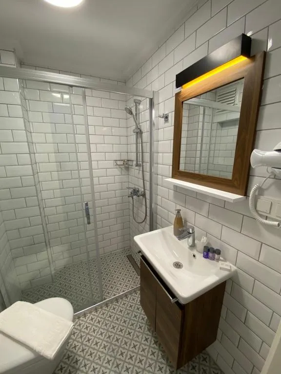 Standart Üç Kişilik Oda,Kısmi Deniz Manzaralı