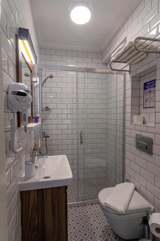 Standart Üç Kişilik Oda,Bahçe Manzaralı