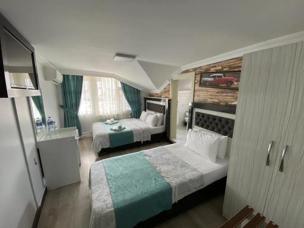 Çatı Katı Standart Oda,Deniz ve Şehir Manzaralı,Balkonlu