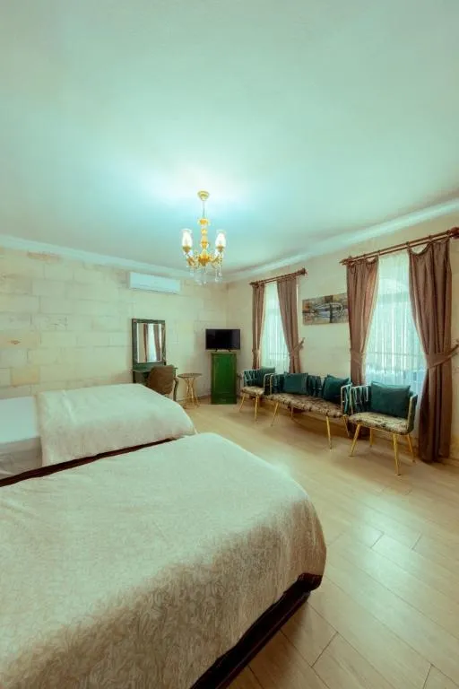 Standart Üç Kişilik Oda,Veranda Manzaralı