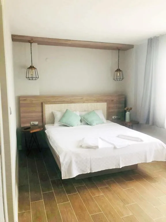 Deluxe Üç Kişilik Oda ,Bahçe Manzaralı