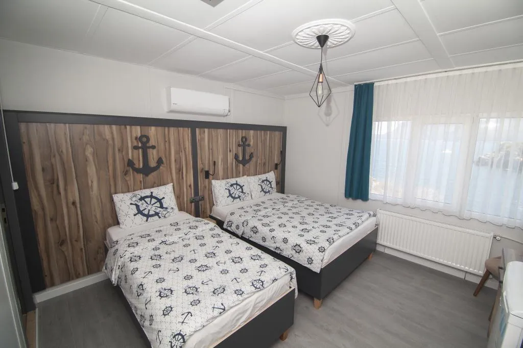 Standart Üç Kişilik Oda,Deniz Manzaralı