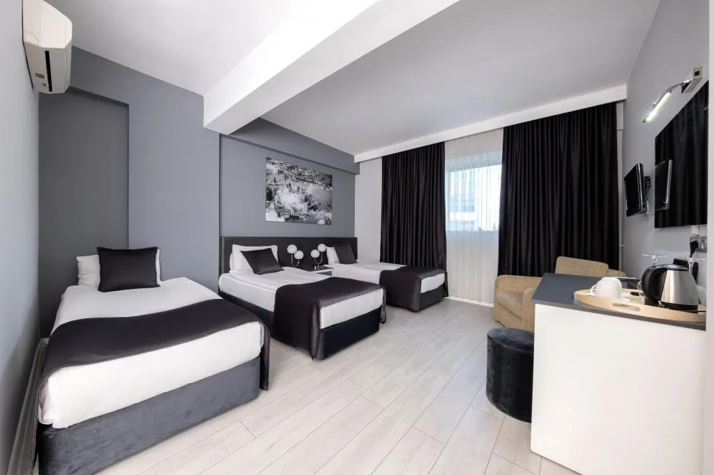 Deluxe Quad Oda,Bahçe Manzaralı,Balkonsuz