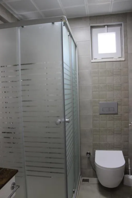 Üç Kişilik Oda,Bahçe Manzaralı,Balkonlu
