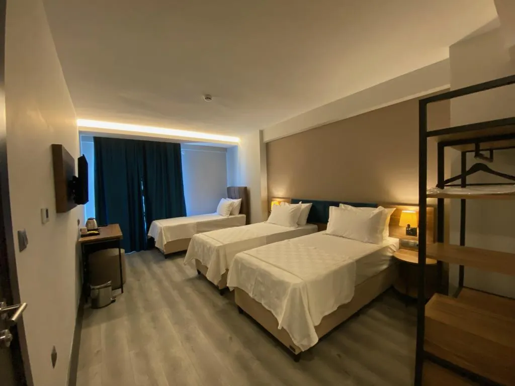 Deluxe Üç Kişilik Oda