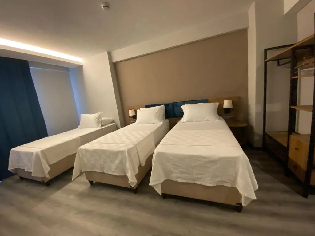 Deluxe Üç Kişilik Oda