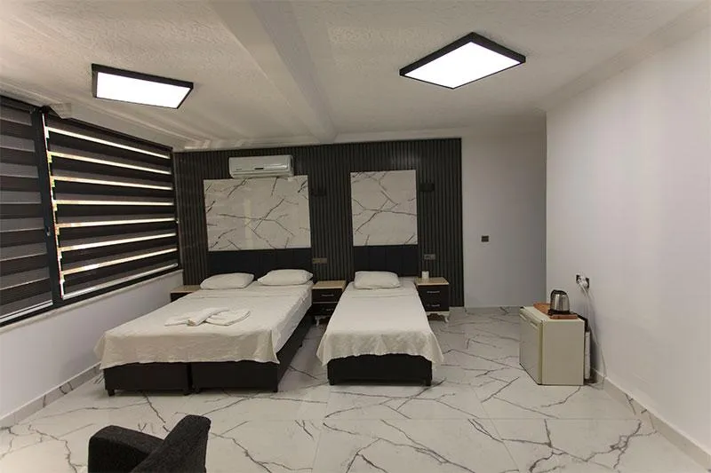 Üç Kişilik Oda,Bahçe Manzaralı