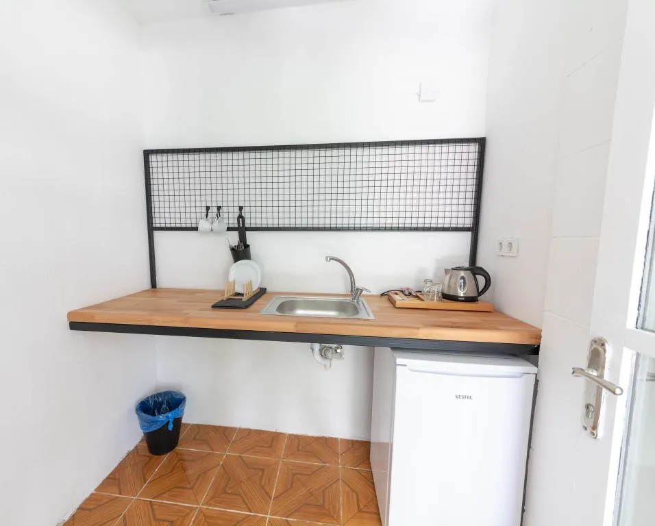Bahçe Katı Standart Oda,Bahçe Manzaralı,Balkonlu