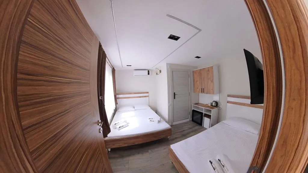 Standart Üç Kişilik Oda,Sokak Manzaralı,Klimalı