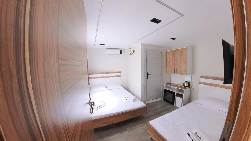 Standart Üç Kişilik Oda,Sokak Manzaralı,Klimalı