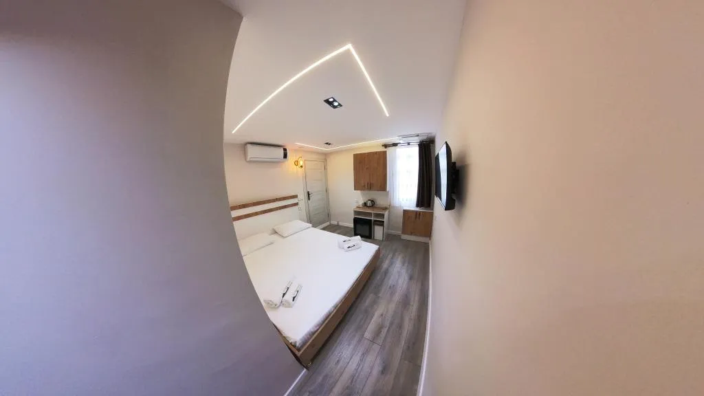 Standart Üç Kişilik Oda,Sokak Manzaralı,Klimalı